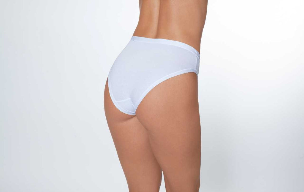 Slip donna a vita media in cotone elasticizzato, disponibili in vari colori, confezioni da 3 pezzi